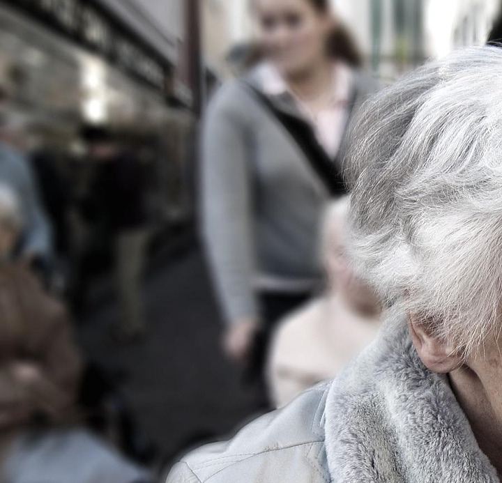 caregiver with senior smiling home care